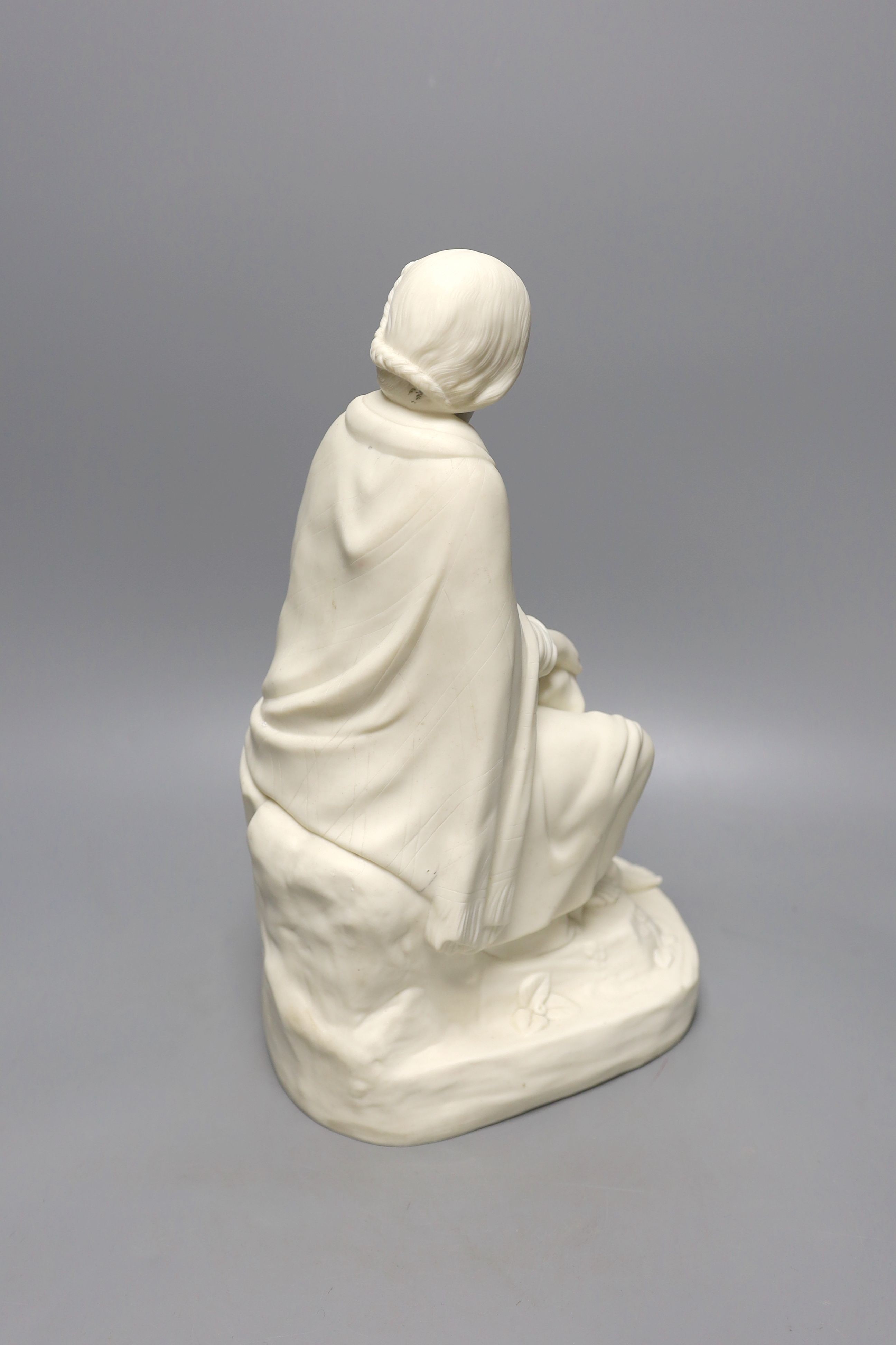 Art Union of Great Britain parian figure of a girl seated on a mound with a cloak on her back, c.1860 36cm